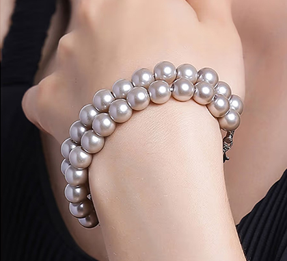 Stone studded metallic pearl bracelet